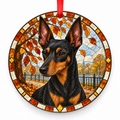 Black and Tan English Toy Terrier (Black and Tan) stained glass style porcelain Christmas ornament with red ribbon